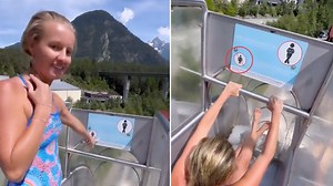 World champion diver ignores 'no women' sign on extreme water slide and goes down it despite warning