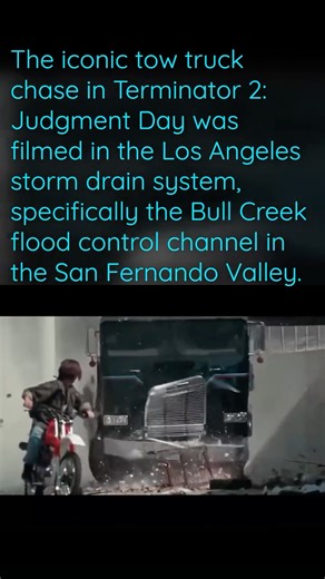 Fact-ish on Instagram: "The tow truck drop in Terminator 2 remains one of the most jaw-dropping stunts ever captured on film. To achieve it, a stunt driver hurled the T-1000’s massive Freightliner tow truck off a 20-foot embankment straight into the Los Angeles drainage canal. The impact was so violent that the truck’s suspension was destroyed on the spot, but James Cameron—always chasing spectacle—decided the raw, destructive energy of the shot was too good to waste. It became the centerpiece o