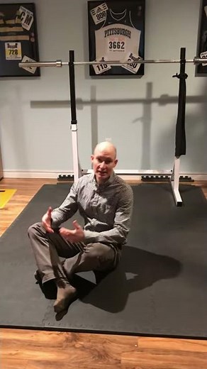 Abdominal brace with heel slide