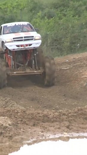 Mega Truck Dam Jump Gone Wrong. #megatruck #mudtruck #mudbog | BUSTED KNUCKLE FILMS