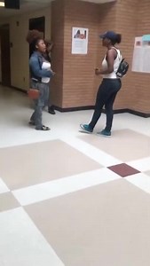 One on one female hood fight.