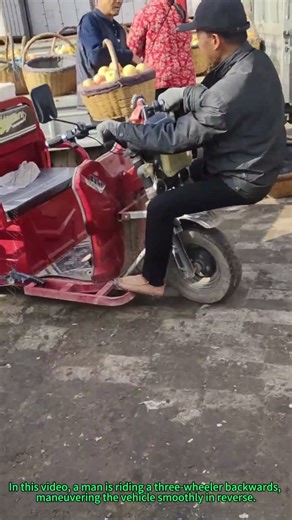 Reverse Tricycle Riding: Man Drives Three-Wheeler Backwards with Impressive Skill
