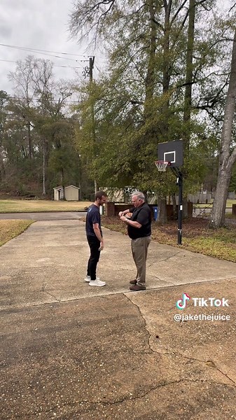 Dad and Kid Show Off Basketball Skills Together