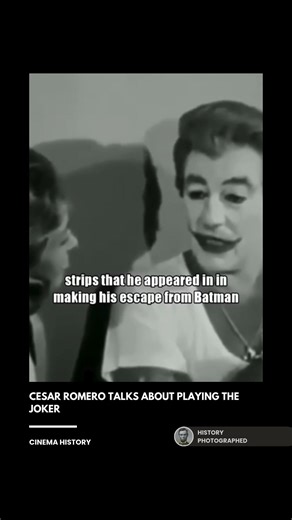 Cesar Romero genuinely loved playing the Joker, finding the "hammy" role a "gas" and an opportunity to break all the traditional rules of acting. He was so committed to his personal image that he famously refused to shave his trademark mustache, which production simply covered with thick white clown makeup, a visible detail that became part of the character's legacy. Credit: Texas Archive of the Moving Image | History In Pictures
