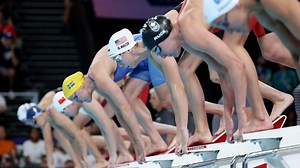 Why do swimmers wear two caps? The reason behind the unusual look