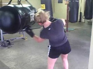 Female Boxing Training Secrets-Upper Cut Bag-Workout-Tips..