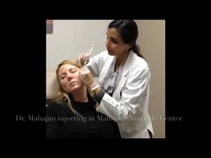 Radiesse injection using cannula to cheeks.