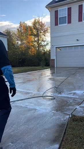 Concrete driveway cleaning with the 20 inch surface cleaner of this beautiful home in Waldorf, Charles County, MD. | Guido Bari