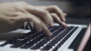 4K Video Close up hand typing notebook keyboard. Background for online shopping and e commerce.