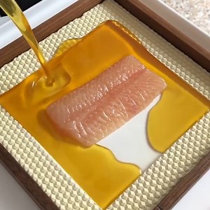 This fish is cooked using melted beeswax. | Insider Kitchen