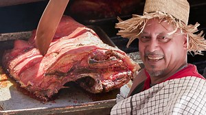 7.6M views · 11K reactions | Angel “Piraña” Jimenez has been serving his legendary Puerto Rican lechón, or roasted suckling pig, to the South Bronx for 20 years. Now, he’s a legend of his community. | Munchies | Facebook