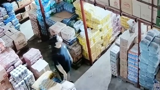 Man passing box takes an unexpected dive after stepping too far near the edge