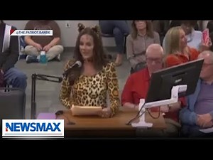 WATCH: Mom protests wokeness in cat costume at school board meeting