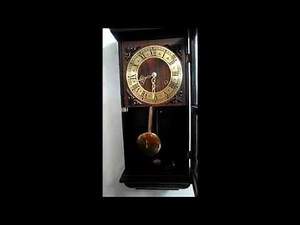 Relógio de Parede Tocando