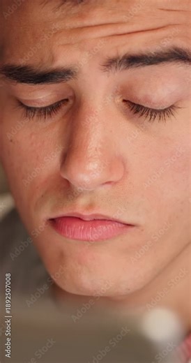 Frown, laptop and reading with designer man in office for development or problem solving. Computer, solution and thinking with confused employee person in design workplace for planning or research