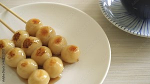 Mitarashi dango. Dumpling in a sweet soy sauce - Japanese traditional style