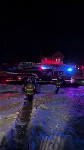Santa Claus And Firefighter Elves And Fire Engine In The Snow 12/15/25