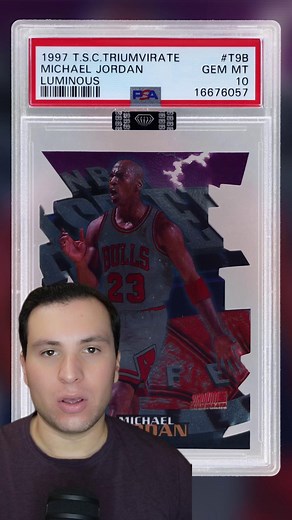 The 1997-98 Topps Stadium Club Triumvirate Luminous Michael Jordan encapsulates the '90s extreme trend. Jordan's intense game face, the strong colors and 3-D graphics in the background all take an in-your-face approach. Then there's the shape, which is a major part of Triumvirate's focus. Each of the 48 cards on the checklist double as puzzle pieces that fit together with two teammates or connecting players. Rather than basic die-cuts, these cards include several cuts and small edges. While it d