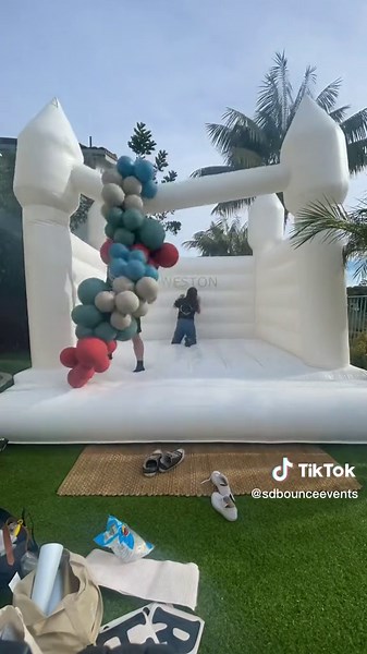 Royal Castle Bounce House Rental with Balloon Garland