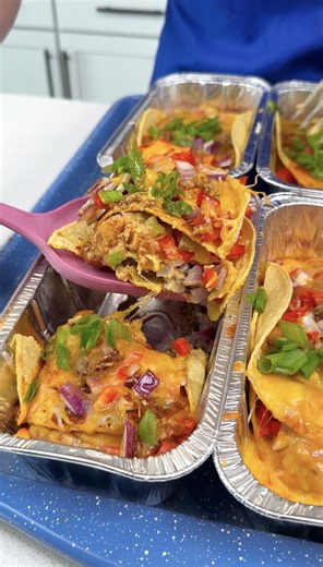 Amy makes a delicious Mexican lasagna with layers of corn tortillas, ground beef, refried beans, cheese, and onions. | Family Style Cooking