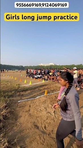 Girls long jump practice