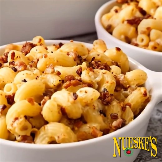 7.1K views · 68 reactions | It's HERE! Introducing the best mac and cheese you’ll ever taste! Rich, cheesy and deeply satisfying, our NEW Nueske's Six Cheese Macaroni and Cheese with Peppered Bacon achieves the perfect balance of smooth cheese and smoky depth. Order some and you'll be coming back for MORE! https://www.nueskes.com/six-cheese-macaroni-cheese-with-peppered-bacon | Nueske's Applewood Smoked Meats | Facebook