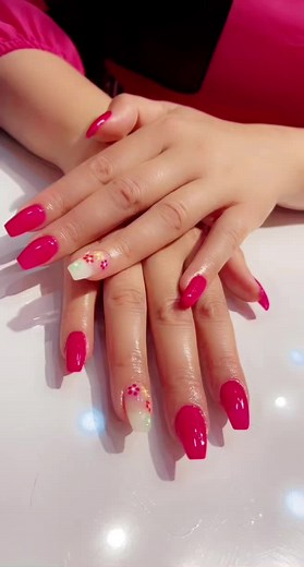 Stunning Pink Stiletto Nails with Floral Design