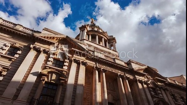 The Old Bailey Central Criminal Court, London, England, UK, with dome, lantern and grand entrance on a civic street