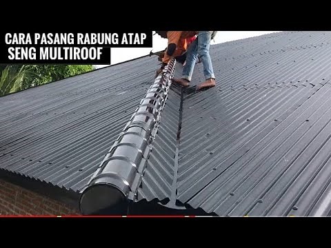 How to install a zinc roof ridge for a minimalist multiroof house