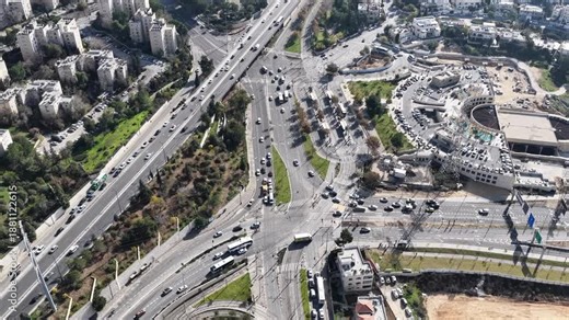 Aerial French Hill Junction Jerusalem Urban Traffic Drone footage shows French Hill junction Jerusalem busy intersection traffic January 1 2026 Israel
