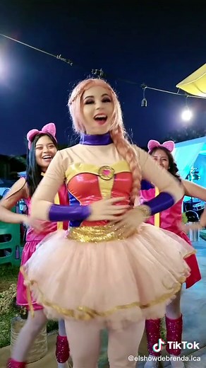 Vibrant Superhero Dance Performance at Night