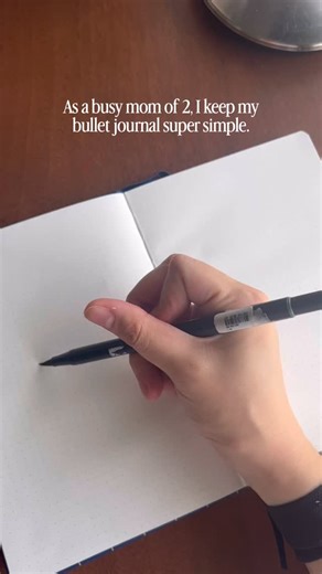 Annette, the Gentle Tiger Mom on Instagram: "As a busy mom, my brain is constantly running a million tabs. I used to make those over-complicated bullet journal spreads, but now I have other things I need to spend my time on. For my 2026 Bujo setup, I’m stripping it back to the basics. This is minimalist journaling that works best for me. No fancy art, just functional tracking, journaling, and planning that actually works. If you’re also a parent looking for a place to share simple organization t