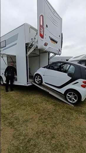 Nearly £300k for this motorhome with a Smart car garage!