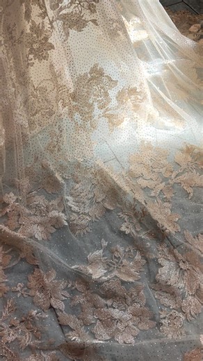 6.4K views · 47 reactions | If jewelry were to become a wedding dress, this would be it - the Vermeil gown. An ethereal ballgown gilded with metallic gold floral embroidery, intricate scalloped lace details, and a cathedral-length train that will take your breath away ✨ For the bride searching for a unique wedding dress with a touch of fairytale romance, Vermeil is the perfect gown made of golden champagne magic. 壟 | Claire Pettibone | Facebook