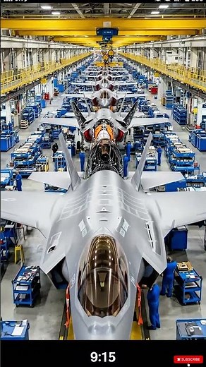 Human technicians guide complex robotics on the factory