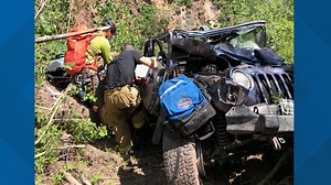 Elderly couple rescued after Jeep rolled 450 feet down steep terrain