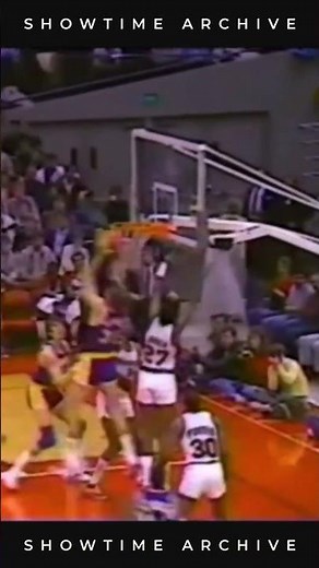 Rambis grabs a HUGE rebound and scores