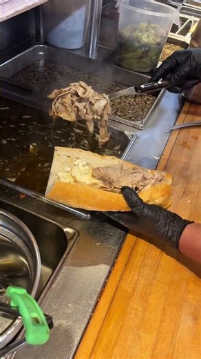 Dinics Roast Pork Sandwich with Sharp Provolone, Rabe, and Long Hots