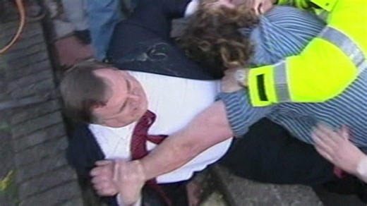 Moment Prescott punched protester who threw egg at him