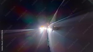 Timelapse of taxi cab driving through American rural roads with little or no lights. Other cars following from behind. Long exposure timelapse of rural traffic during evening.