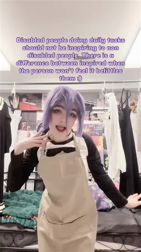 💓💓Kipo/Anna💓💓 on Instagram: "And that’s making the world better Alt text: Disabled people doing daily tasks should not be inspiring to non disabled people. There is a difference between inspired when the person won’t feel it belittles them :) Girl in Reze cosplay in a purple wig in a bun with a beige apron over top with a black sleeve and white shirt and jeans dancing to KATSEYE “GABRIELLA” #disabled #nothingaboutuswithoutus #bionicwoman #autism #reze"