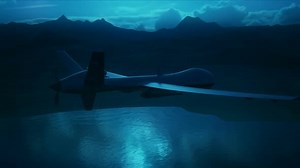 Unmanned Aerial Vehicle Flying Over Dark Water and Mountains