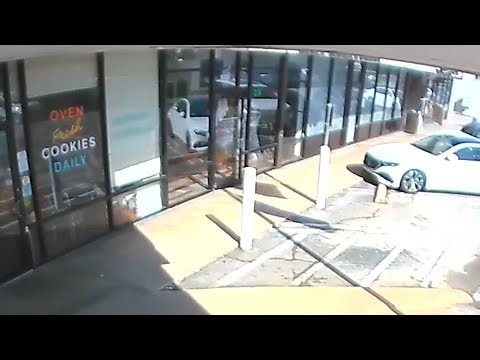 RAW VIDEO | Car slams right into business in West University
