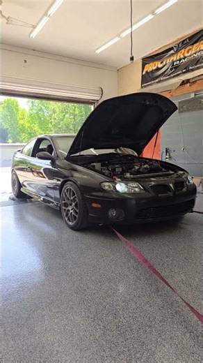 2006 GTO M6 with a cam, headers to SLP bullets, and LSA at 10 psi on 93