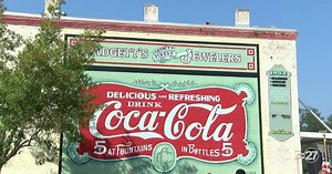 Quincy unveils restored downtown mural revealing rich history