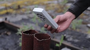 clip-1108172755-scientist-measures-radiation-dosimeter-radioactive ...