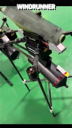 Why does a drone need to be equipped with a fiber-optic cable, and what exactly is it used for?