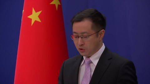 China 'deeply shocked' by Japan embassy intruder