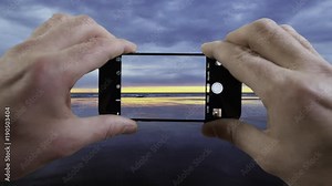 Cellphone taking video of Cape Cod beach
