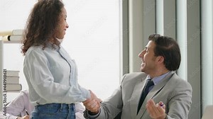 Business men and women in casual wear meet and brainstorm on new document projects. working together in planning strategies for success with teamwork.